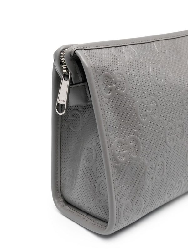 Gucci GG monogram-embossed clutch bag - Image 4